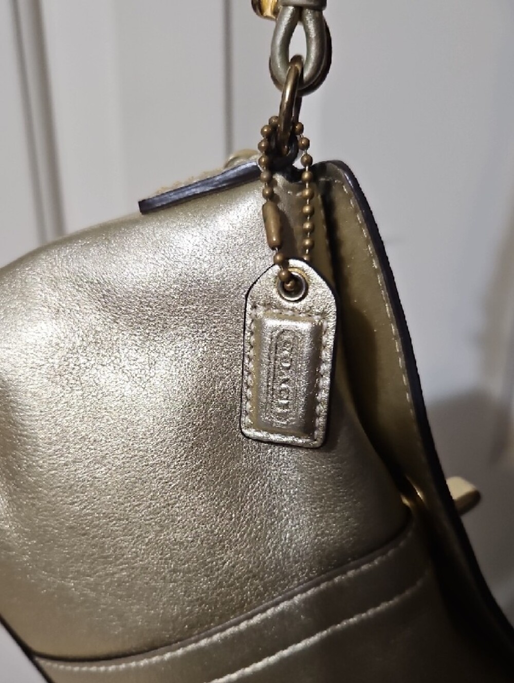 Coach NWOT Turnlock Metallic Gold Wristlet - Picture 9 of 15